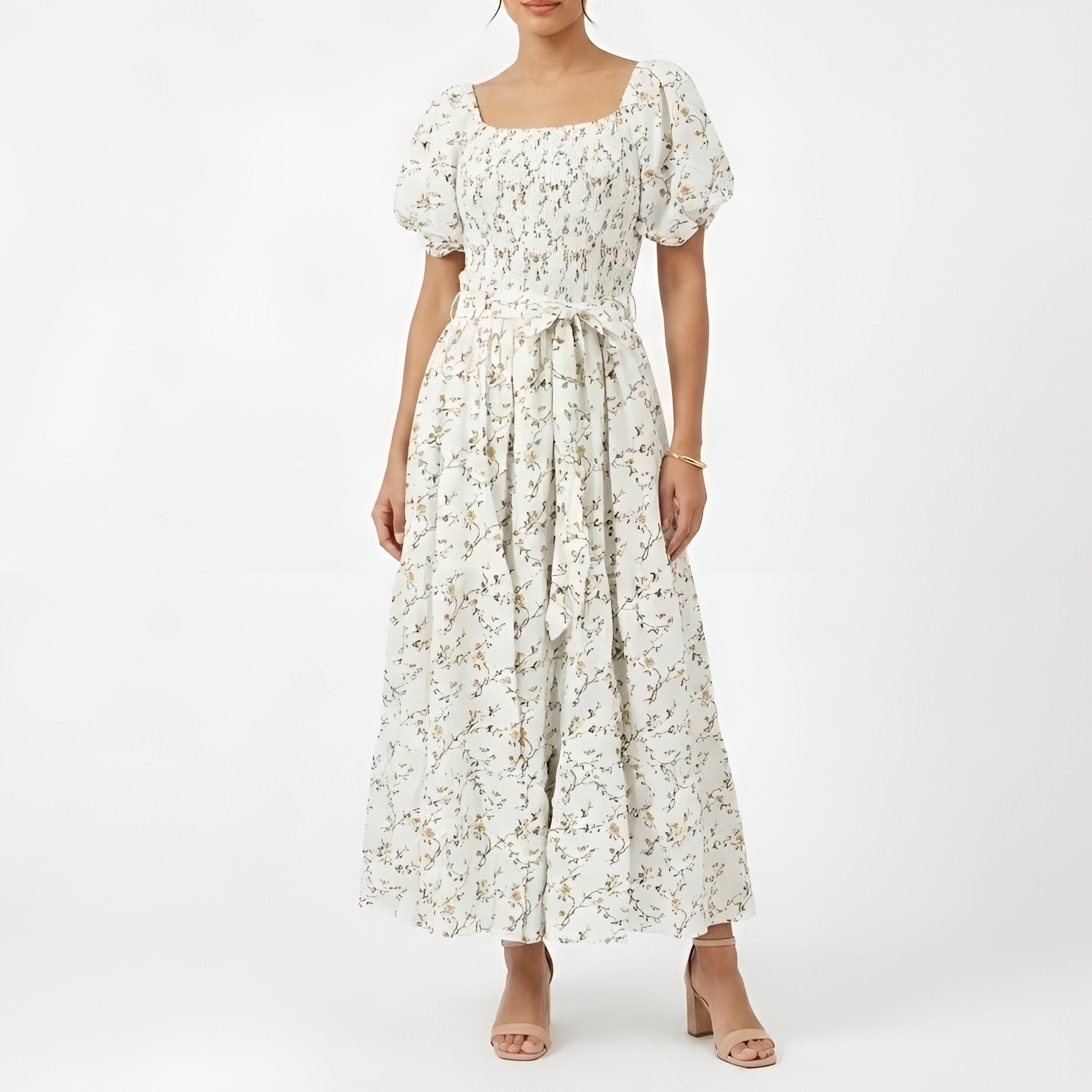 Woman wearing a floral dress on a white background