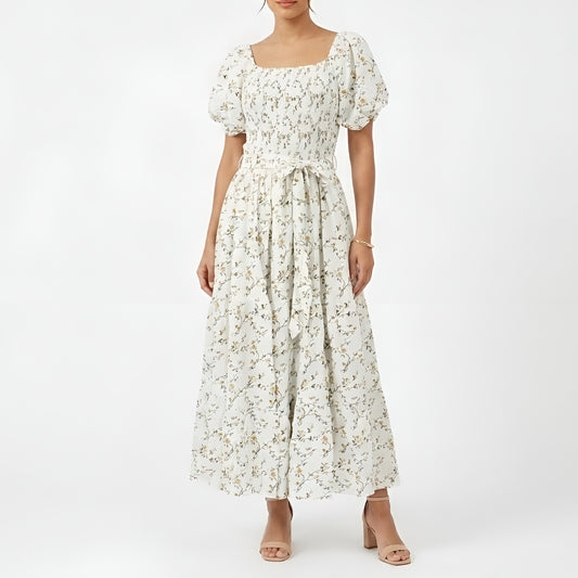 Woman wearing a floral dress on a white background