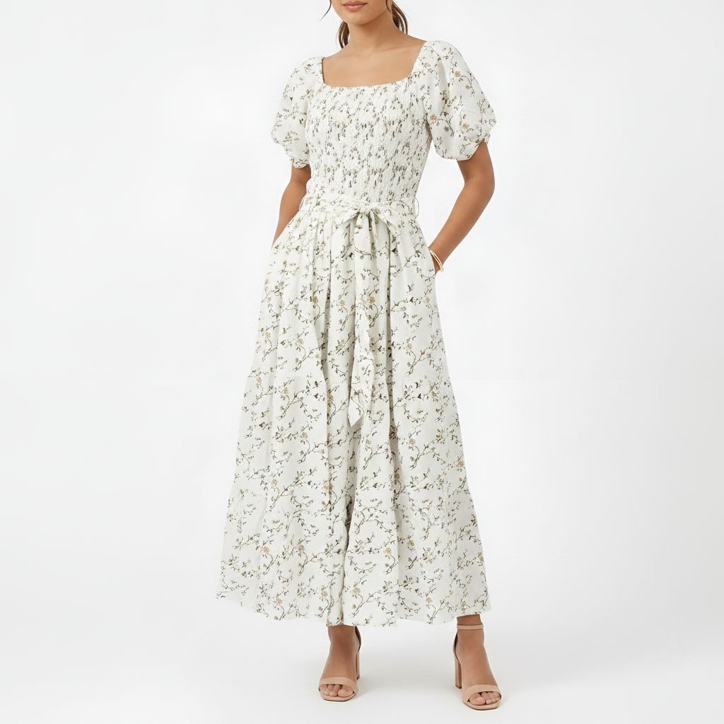 Woman wearing a floral dress on a white background